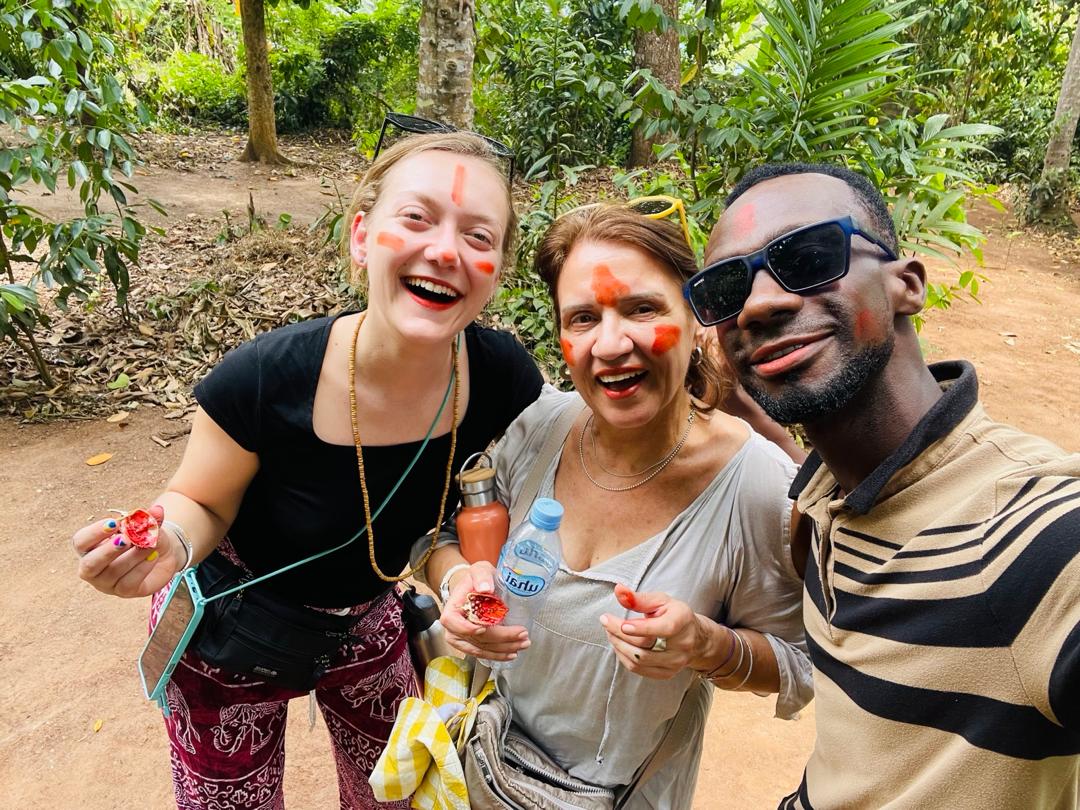 Annatto face paint on a family spice farm near Jambiani